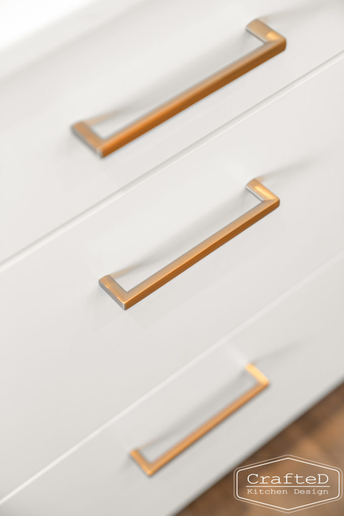gold hardware on white kitchen cabinets in spokane kitchen remodel