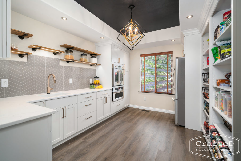 pantry remodel with unique floating shelves, chevron tile patterned, black ceiling color