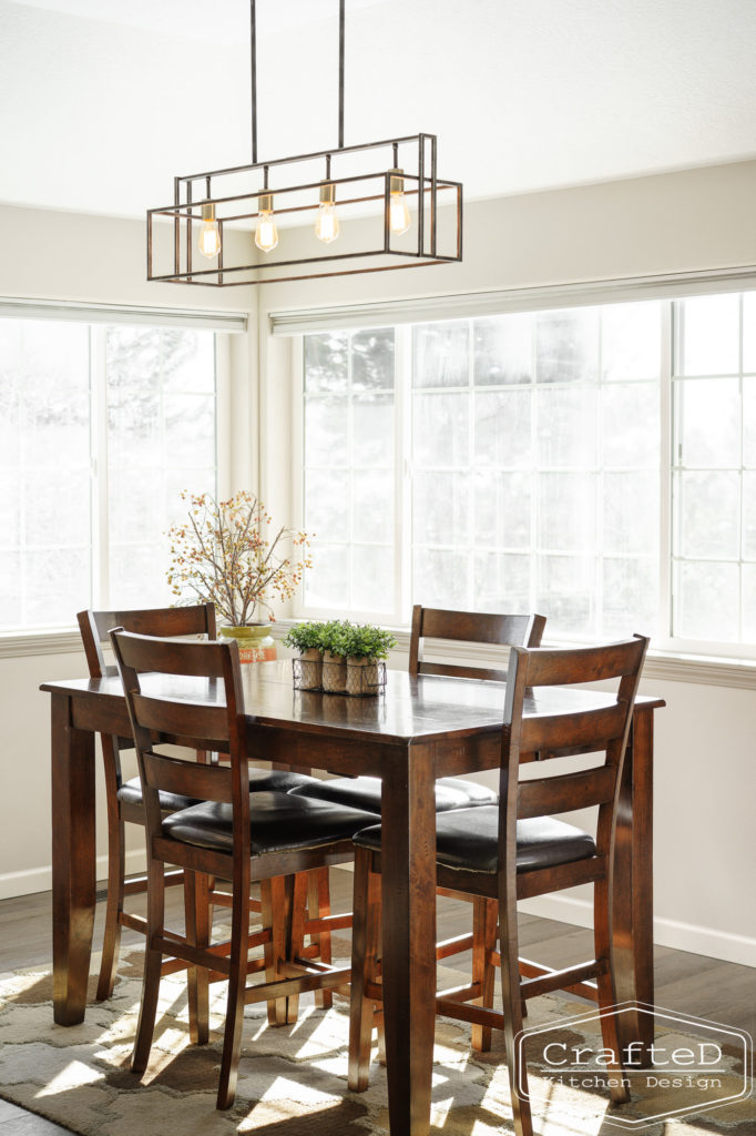 decorative pendant lighting above dining table