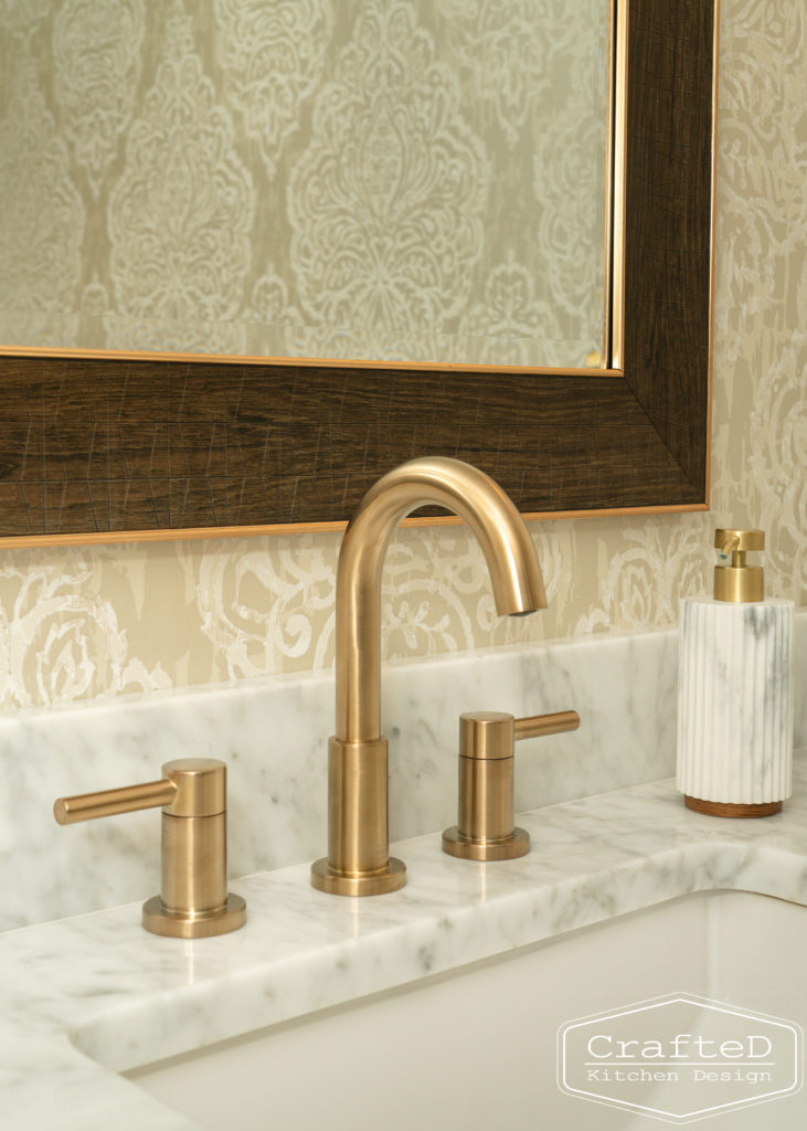 traditional sophisticated modern powder bathroom with gold accents spokane cda interior design