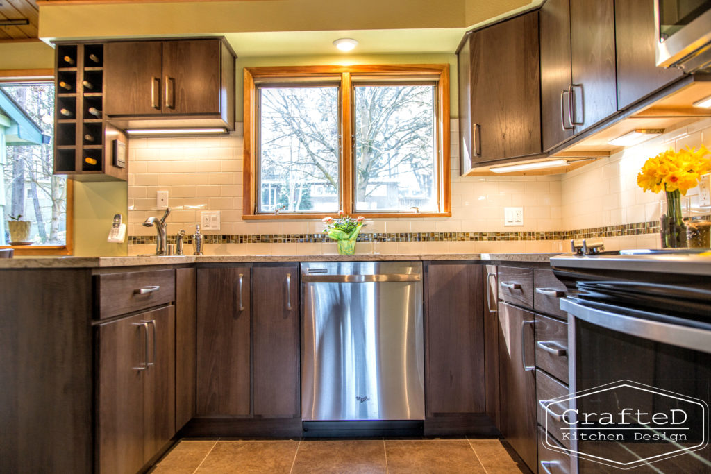 wood cabinet kitchen with wood paneling on ceiling