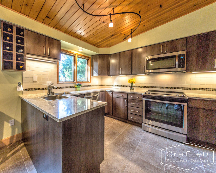 wood cabinet kitchen with wood paneling on ceiling