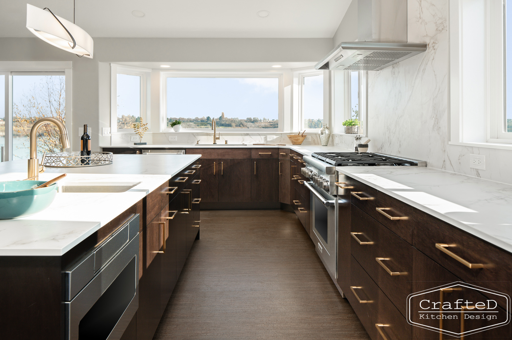 modern metropolitan kitchen design with dark toned wood cabinets, dekton marble backsplash and gold accents in spokane Coeur d'alene moses lake home renovation