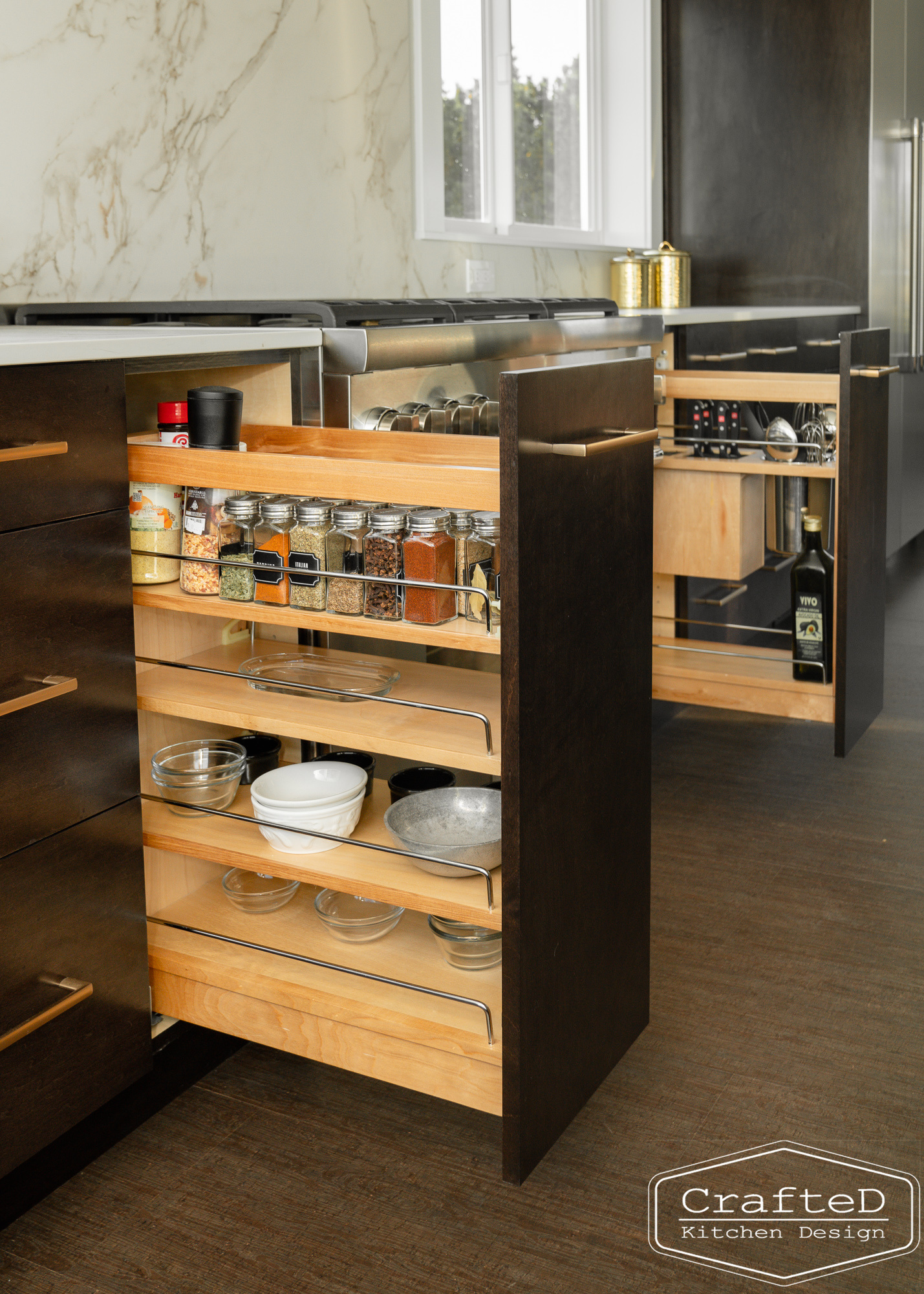 modern metropolitan kitchen design with dark toned wood cabinets, dekton marble backsplash and gold accents in spokane Coeur d'alene moses lake home renovation