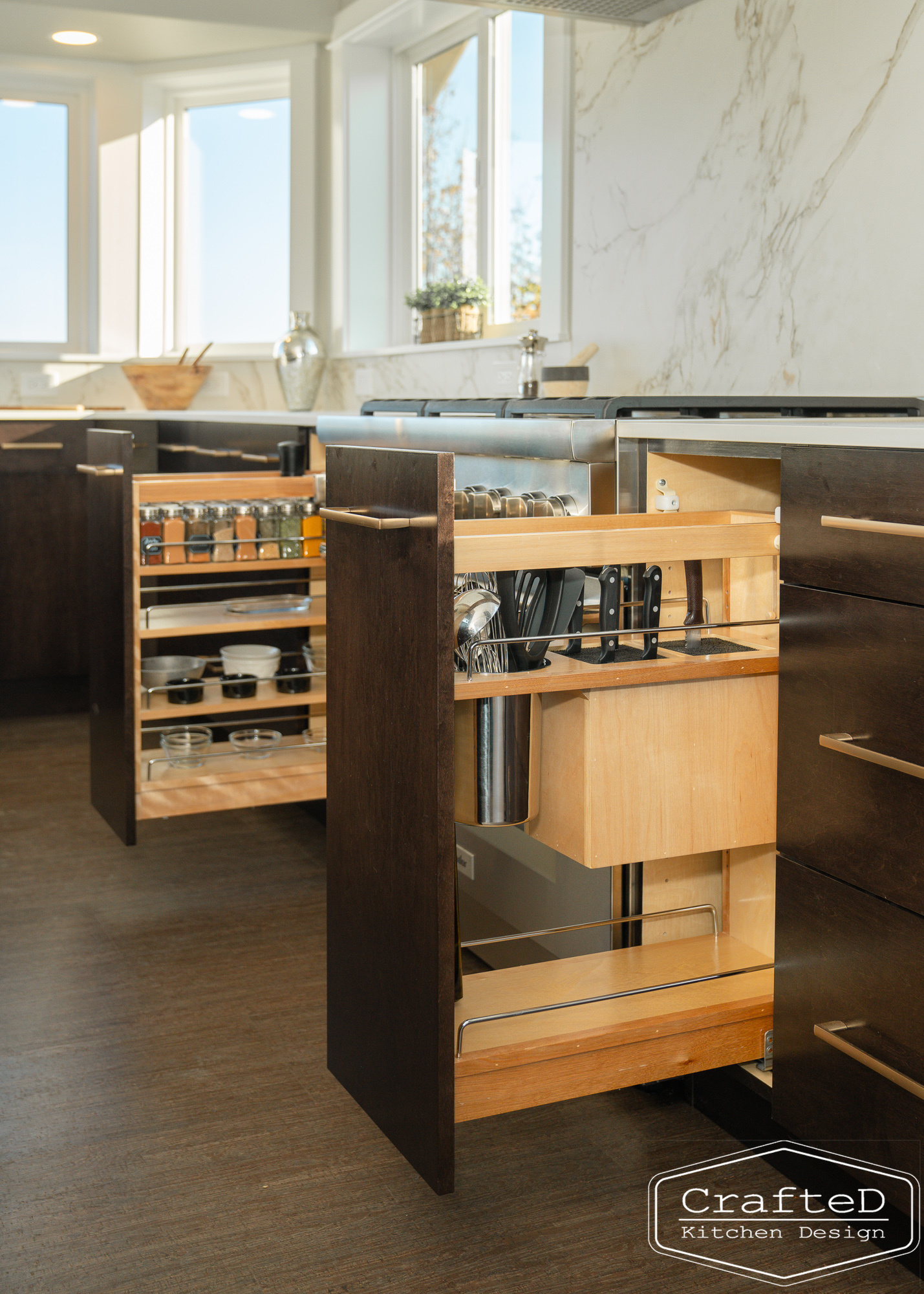 modern metropolitan kitchen design with dark toned wood cabinets, dekton marble backsplash and gold accents in spokane Coeur d'alene moses lake home renovation