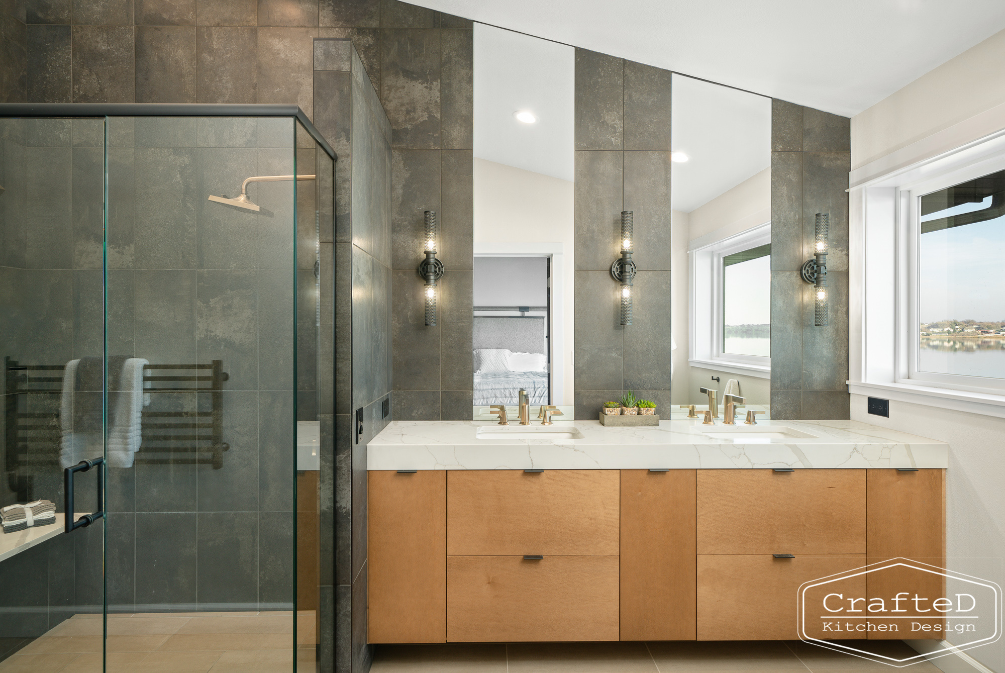 modern metropolitan bathroom design with dark toned wood cabinets, dekton marble backsplash and gold accents in spokane Coeur d'alene moses lake home renovation