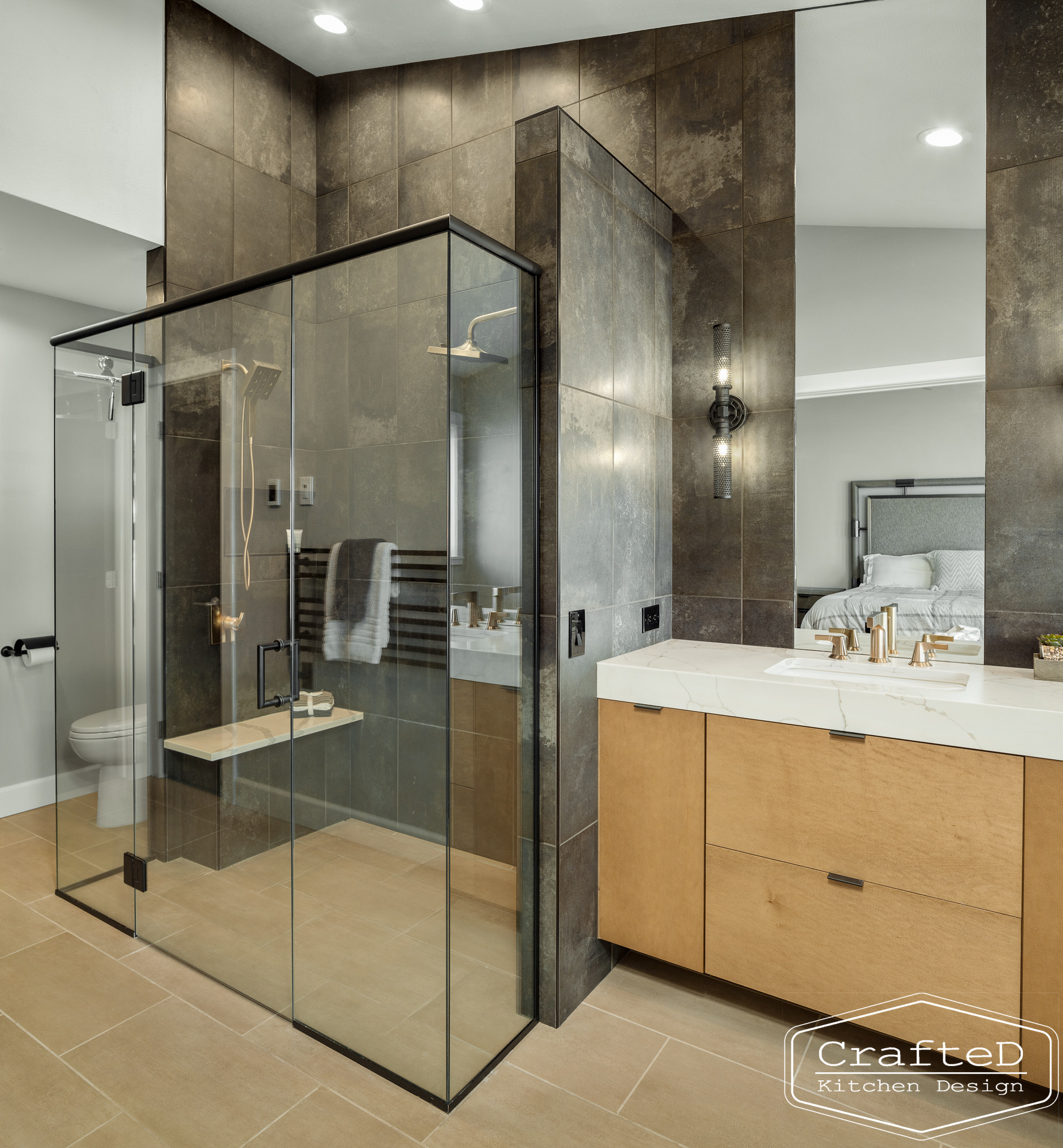 modern metropolitan bathroom design with dark toned wood cabinets, dekton marble backsplash and gold accents in spokane Coeur d'alene moses lake home renovation