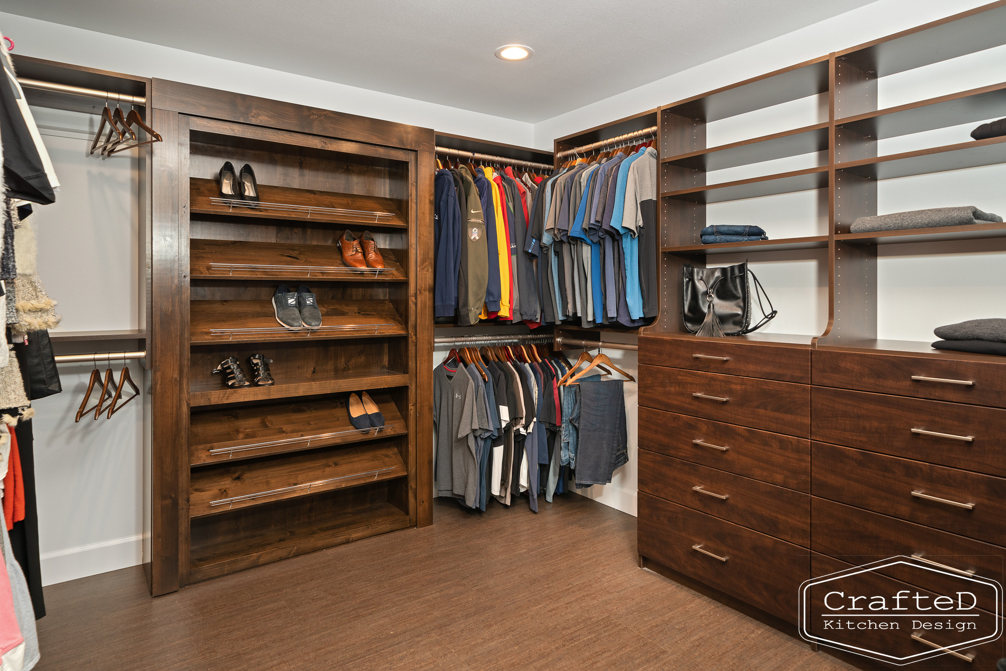 modern metropolitan bcustom closet design with dark toned wood cabinets, dekton marble backsplash and gold accents in spokane Coeur d'alene moses lake home renovation