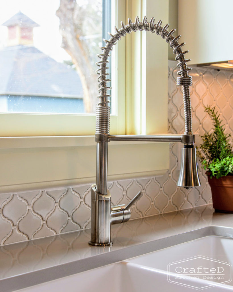 traditional kitchen design with large island hardwood floors and sink faucet