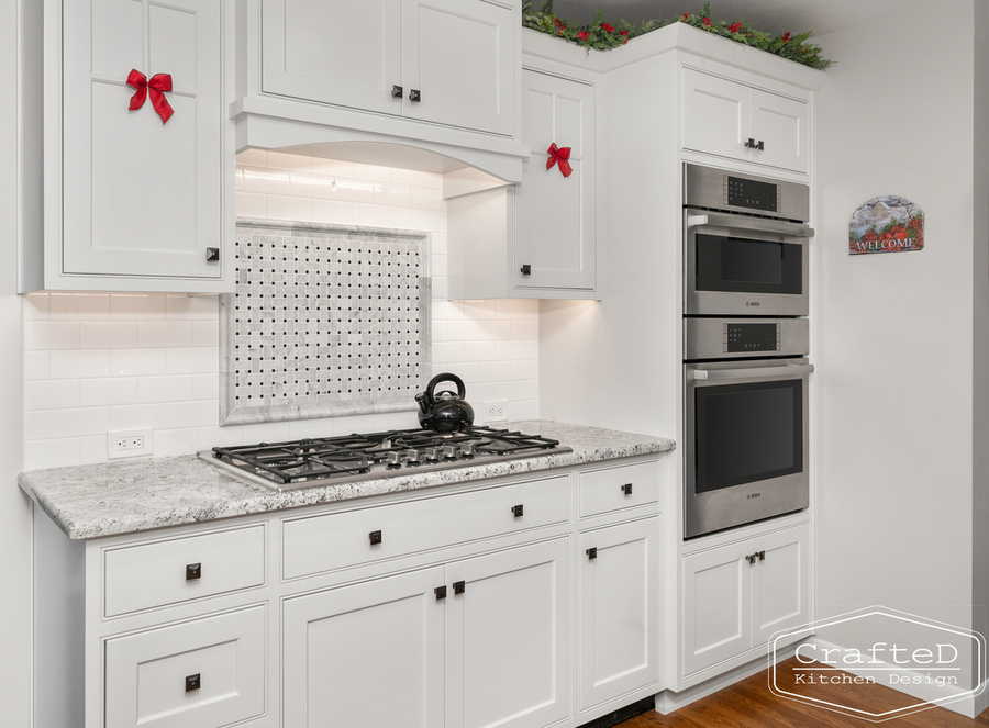 black and white marble kitchen range tile accent above range and bosch appliances